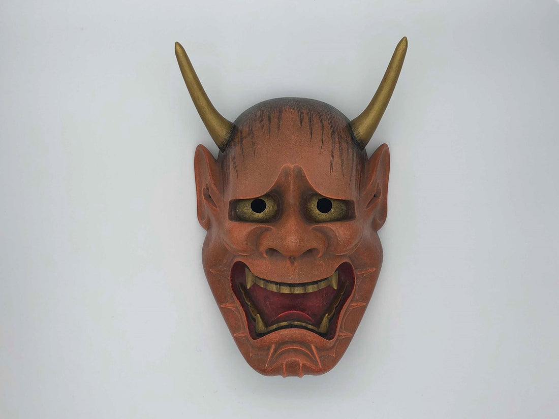 A hannya-type noh mask with gold horns and an open mouth, one of the classic noh mask types | KAMENYA OMOTE