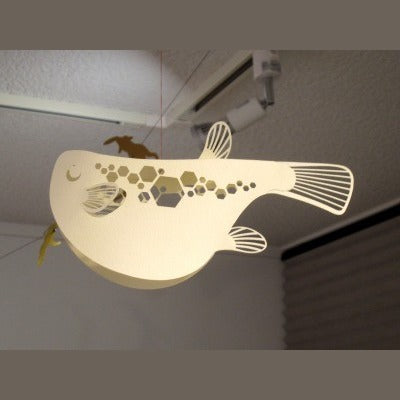 Fuku-Fuku Pufferfish ornament hanging from ceiling