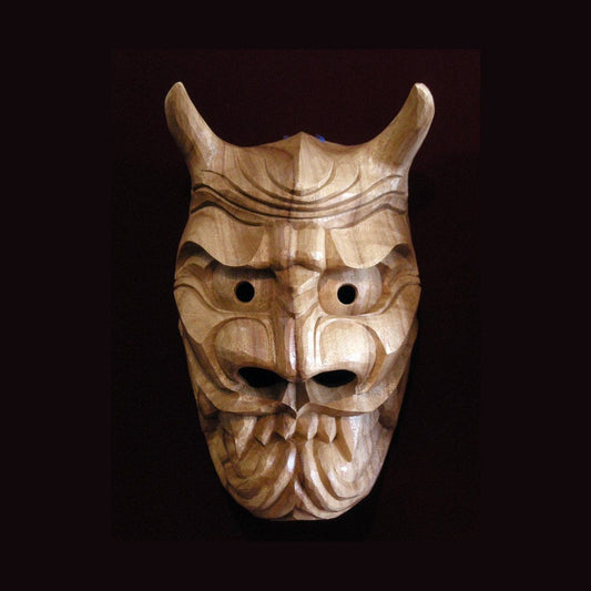 The "un" furyu mask in plain camphor: mouth closed, large round eyes, two long curving horns