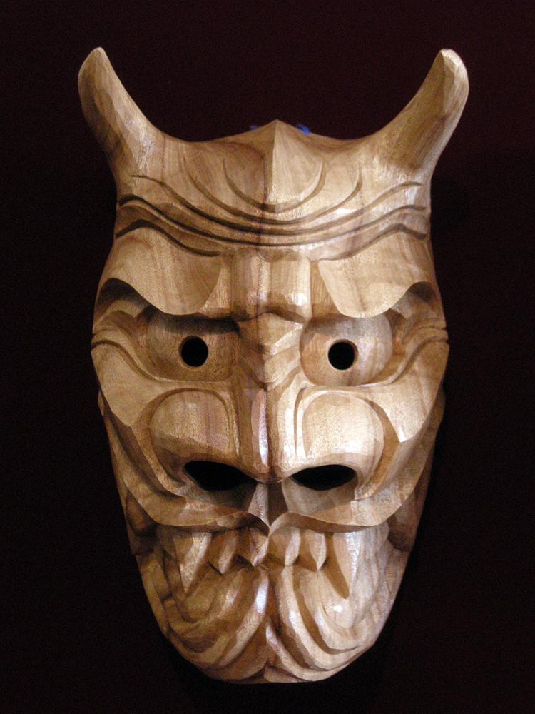 The male furyu mask in plain camphor: mouth closed, large round eyes, two long curving horns