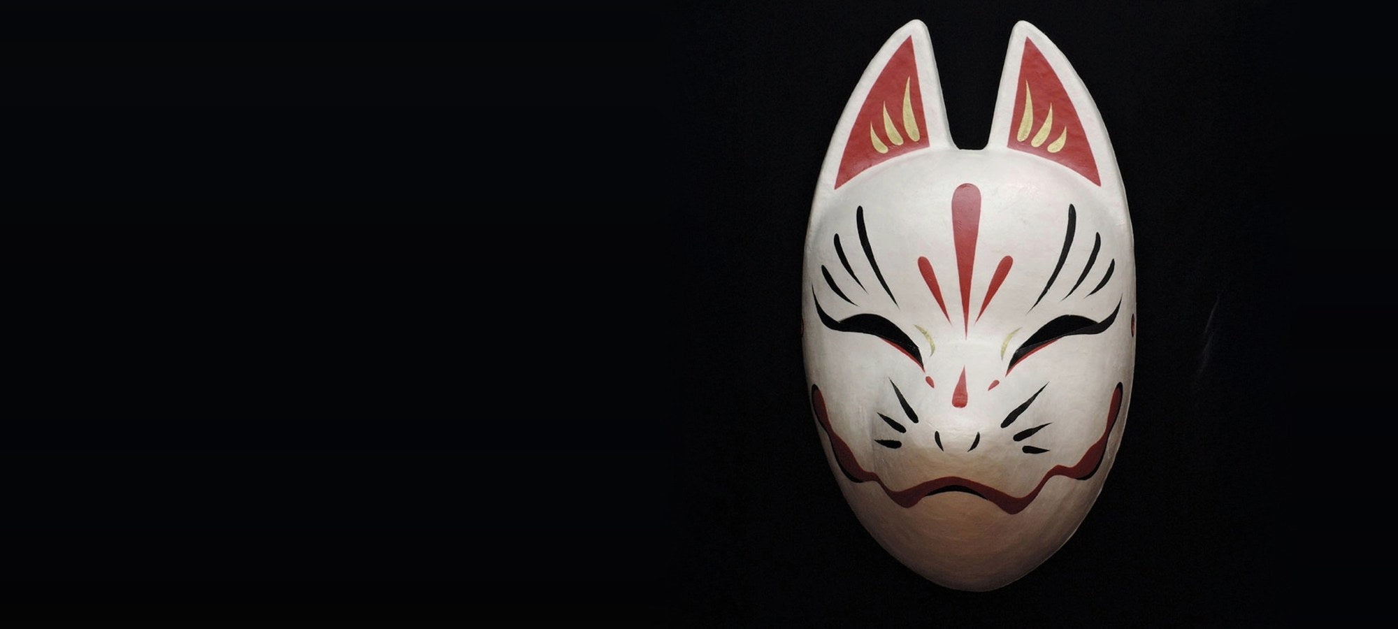 Suzune white fox mask with vermilion ears, emerging from black